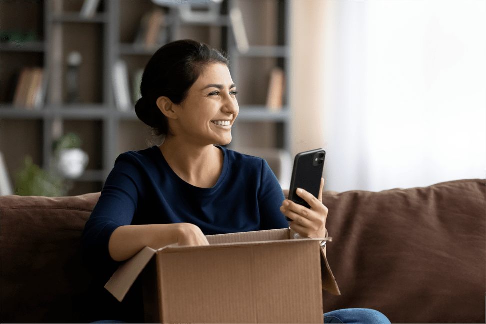 Customer receiving a parcel at home