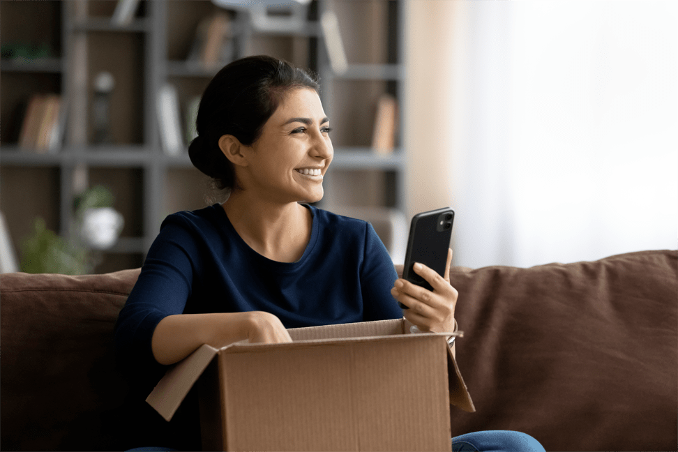Customer receiving a parcel at home